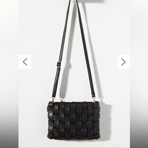 Lindy black woven clutch by Anthropologie